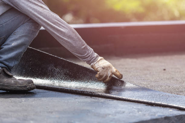 Professional Waterproofing technician working in East Rochester, NY